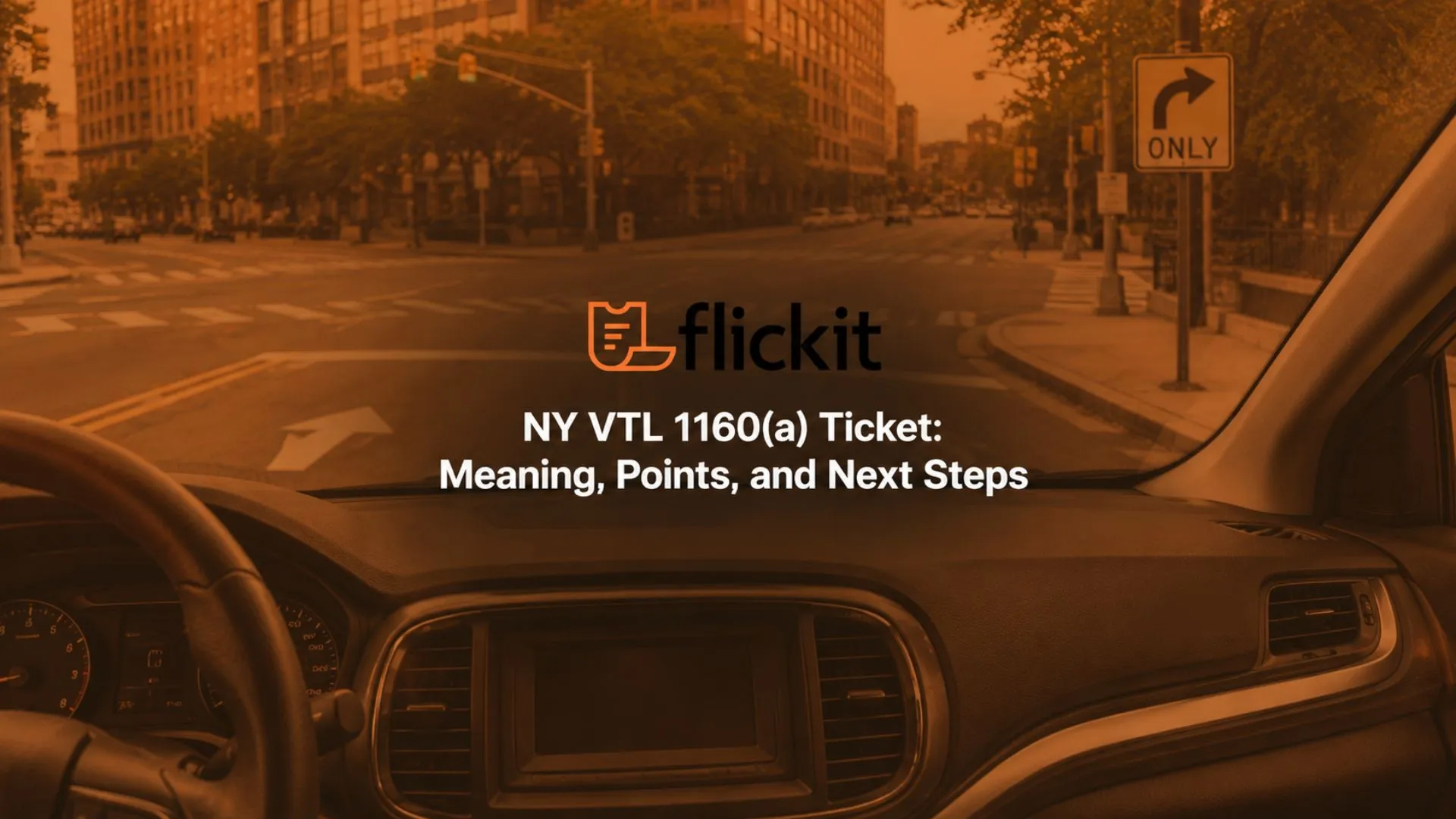 This image shows a driver’s view from inside a car approaching a New York City intersection with a marked right-turn lane and a roadside right-turn-only sign. Road arrows, traffic signals, crosswalk markings, sidewalks, trees, and surrounding city buildings help illustrate the type of urban setting where an improper right-turn citation may occur. The scene provides visual context for a New York VTL 1160(a) ticket and the roadway conditions a driver may need to review after receiving an improper right-turn citation.